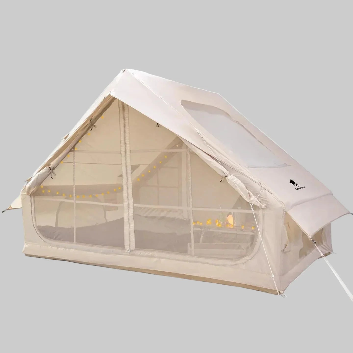 Beige camping tent with mesh windows and string lights inside on gray background